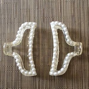 Pair of claw hair clips with white faux pearl ornament